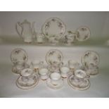 A collection of Paragon China Malandi pattern tea wares with violet printed decoration comprising