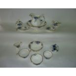 A collection of Royal Albert Moonlight Rose pattern wares comprising a ewer and basin, a posy vase