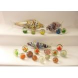 Three Murano glass models of fish, all with chaotic mottled polychrome decoration, the largest