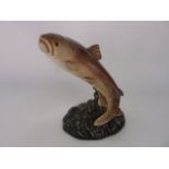 A Beswick model of a leaping trout with impressed and printed marks to base, numbered 1032