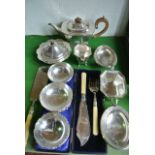 A good quality silver plated sugar basin and milk jug, a further teapot, two egg shaped bon bon