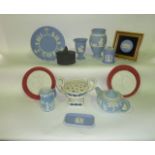 A collection of Wedgwood Jasperwares including a white ground two handled potpourri bowl with