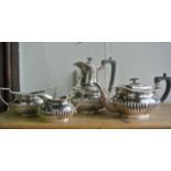An A1 silver plated coffee pot, teapot, two handled sugar basin and milk jug, all with vertical