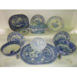 A collection of mainly 19th century blue and white printed ceramics including a tureen and cover