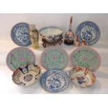 A quantity of 19th century and other oriental ceramics including an Imari bowl with flowering tree