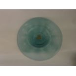 A 20th century pale blue studio glass charger of circular form with central well, 43 cm diameter