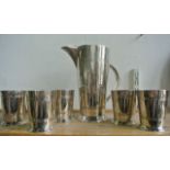 A good quality silver plated drinks set comprising jug of tapering cylindrical form with