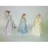 Three Royal Worcester figures comprising First Dance 3629 and Sweet Anne 3630, both modelled by F