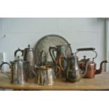 A silver plated coffee pot with scrolling embossed handle, a small 19th century copper kettle, an