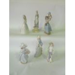 A Lladro Daisa model of a young girl balloon seller together with two further Lladro Daisa