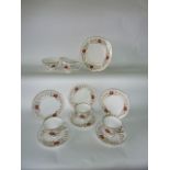 A quantity of Susie Cooper Mariposa pattern tea wares number C2103 comprising a pair of cake plates,