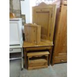 A 19th century stripped pine side table of rectangular form with shallow frieze drawer raised on