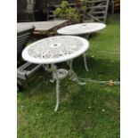 A Victorian style cast aluminium garden terrace table, the circular top with decorative pierced