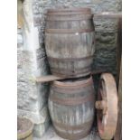 Two large coopered oak and steel banded barrels