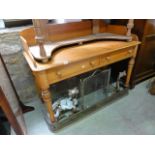 A Victorian stripped pine washstand of rectangular form with moulded outline raised three quarter