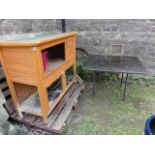 A contemporary two tier freestanding rabbit hutch with plaque Bunny Business pet supplies together