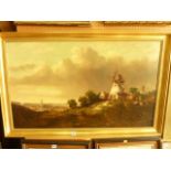 A 19th century oil painting on canvas of an extensive landscape with windmills, distant church,