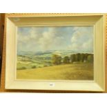 An oil painting on board of an extensive country landscape with church tower to the distance and