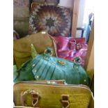 A selection of ladies handbags to include an example in various examples of snakeskin, leather and