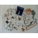 A miscellaneous collection of costume jewellery, including a lady's stainless steel wristwatch,