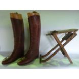 A pair of good quality tan leather riding boots fitted with three sectional timber trees, a