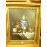 An oil painting on canvas of a still life with oriental vase, fruit, drinking glass, etc, signed