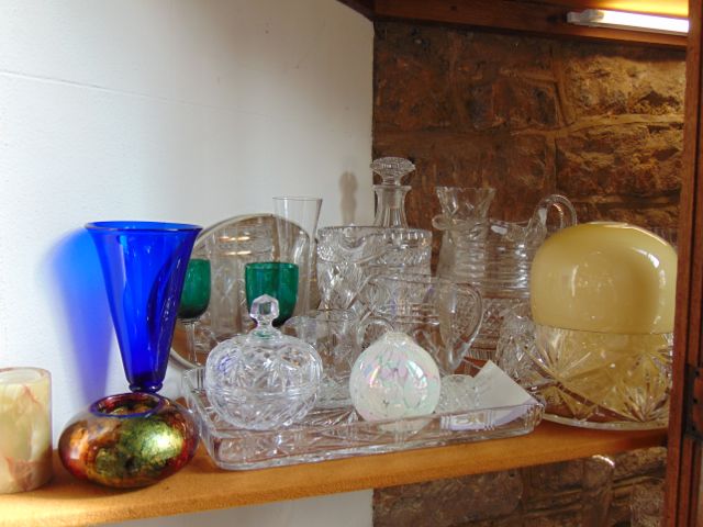 An extensive collection of cut glassware including a set of six Waterford stemmed glasses and one