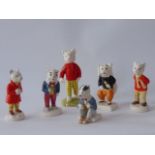 A collection of Beswick and Beswick ware figures from the Rupert Bear Series including Rupert