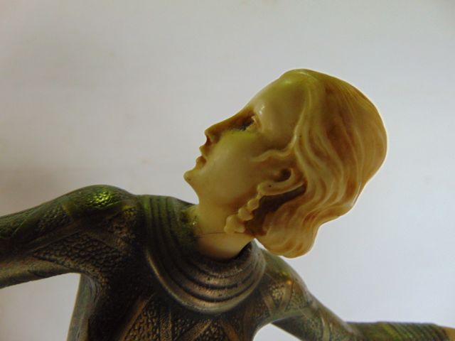 A figure of an elegant standing female in the Art Deco manner, with patina type finish and ivorine - Image 2 of 3