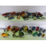 A box containing a mixed assortment of vintage model vehicles to include examples mostly by Corgi