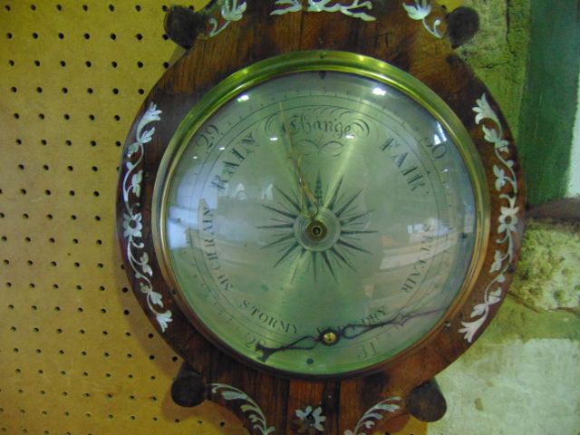 A 19th century wheel barometer set within a rosewood veneered shaped case with silvered dial and - Image 2 of 2