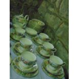 A collection of Paragon China Country Lane pattern tea and dinner wares comprising teapot, milk jug,