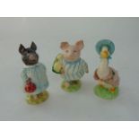 Three Beswick Beatrix Potter figures comprising Little Pig Robinson with gold back stamp to base,