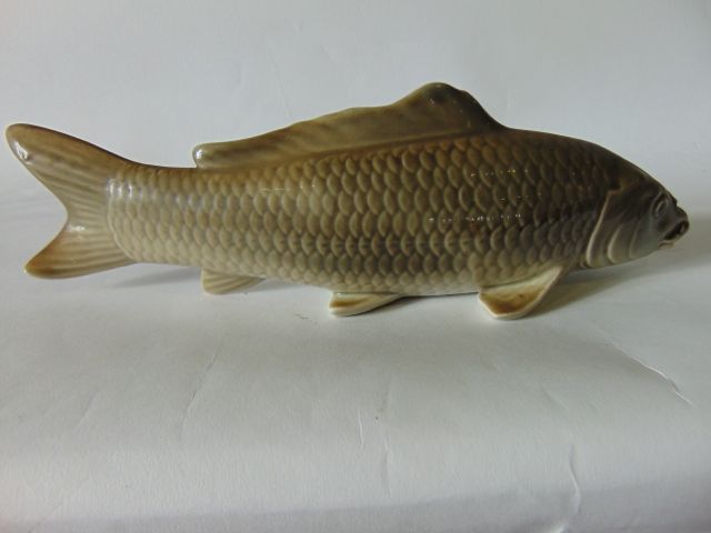 A model of a carp naturalistically modelled and painted in tones of grey, with impressed mark to - Image 2 of 2