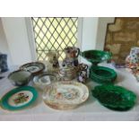 A collection of 19th century green glazed majolica wares of various design including two handled
