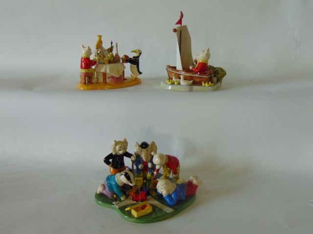 A collection of three limited edition Royal Doulton figure groups from the Rupert Bear Series