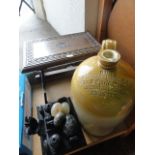 An ebony desk set with baluster shaped inkwells, pen dish and carved elephant detail, a small