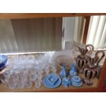 A quantity of cut glass drinking glasses including brandy goblets, whisky tumblers, etc together