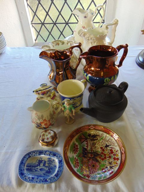 A Coalport jug and basin, both with painted floral sprigs and sprays and relief moulded floral