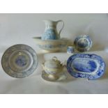 An early 19th century blue and white printed meat plate of oval form showing a view of the Thames at