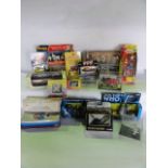 A box containing a quantity of further vintage boxed models, vehicles, etc, to include a boxed Dinky