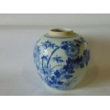 A 19th century oriental vase of globular form with blue and white painted rock, bamboo and