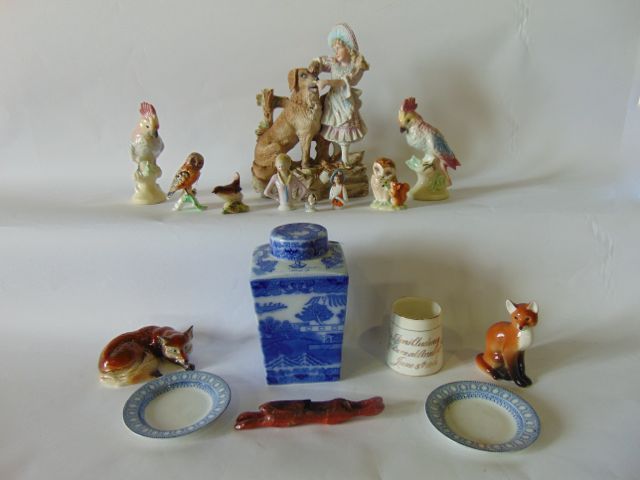 A collection of ceramics including a late 19th century continental bisque group of a young girl