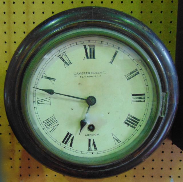 A small 19th century dial clock with 8 inch face and single train movement, Cameron Cuss & Co, 56