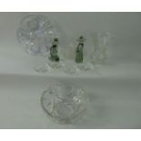 A set of four glass drip pans with moulded mark Baccarat, a heavy cut glass bowl with shaped rim and
