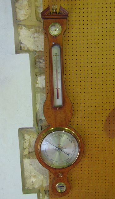 A 19th century satinwood cased wheel barometer with silvered dials and inlay to borders, 99 cm