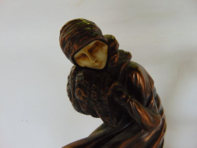 A figure of an elegant standing female in the Art Deco manner, with patina type finish and ivorine - Image 3 of 3