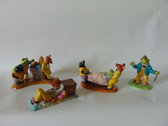 A collection of Royal Doulton figures from The Wind in the Willows Series - Sprawling by the River