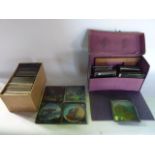 Approximately fifty five glass magic lantern slides detailing subjects to include early photographic