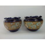 A pair of Doulton Lambeth Slaters jardinieres with turquoise, white and gilt floral lace effect